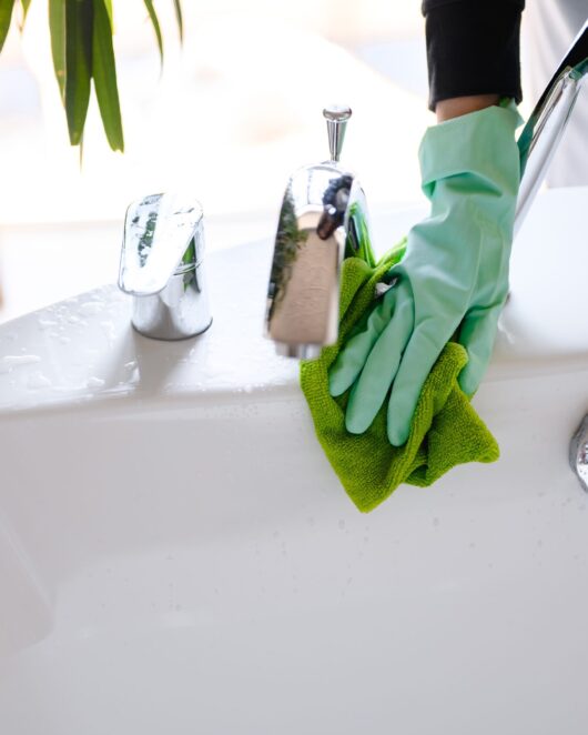a-girl-in-green-rubber-gloves-and-a-gray-apron-was-2025-01-08-23-35-28-utc