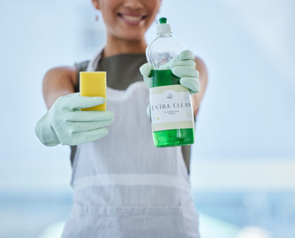 Woman, hands and domestic holding detergent for cleaning, hygiene or disinfecting equipment at home.